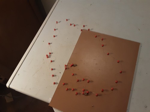 Lungo filo con perline rosse - lungo,